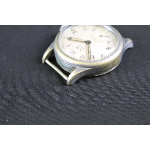 14 - AN ALPINA KRIEGSMARINE MILITARY ISSUE WATCH. Circular cream dial signed K.M.592 with arabic index an... 