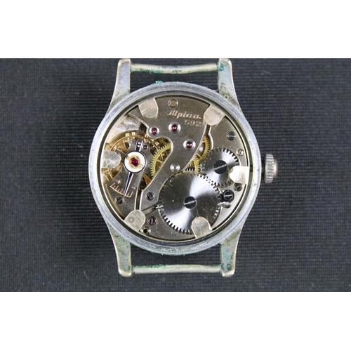 14 - AN ALPINA KRIEGSMARINE MILITARY ISSUE WATCH. Circular cream dial signed K.M.592 with arabic index an... 