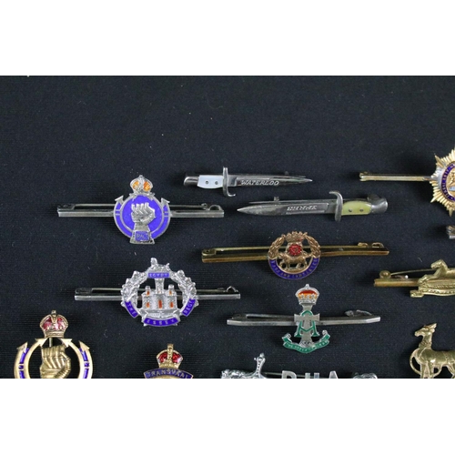 15 - A collection of nineteen British military regimental sweetheart brooches to include : Royal Armoured... 