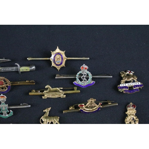 15 - A collection of nineteen British military regimental sweetheart brooches to include : Royal Armoured... 