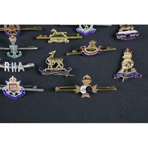 15 - A collection of nineteen British military regimental sweetheart brooches to include : Royal Armoured... 