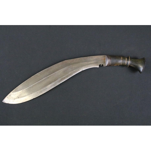 162 - An early to mid 20th century kukri knife, fullered blade, steel blade, horn handle, leather covered ... 