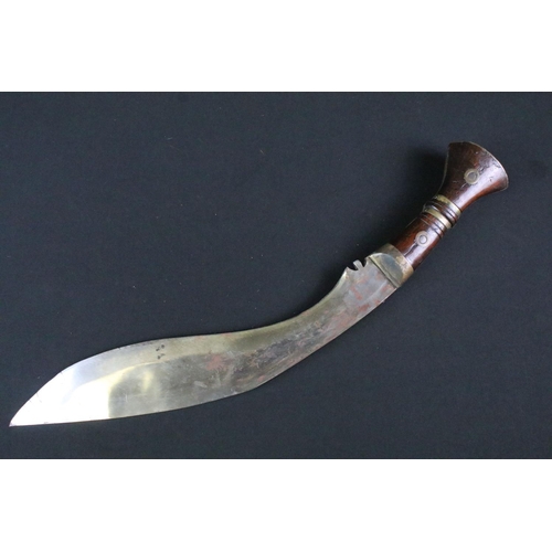 168 - A 20th century military Kukri knife, steel blade marked 1917 CoJ together with the British broad arr... 