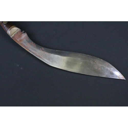 168 - A 20th century military Kukri knife, steel blade marked 1917 CoJ together with the British broad arr... 