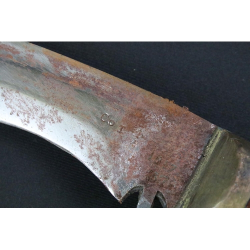 168 - A 20th century military Kukri knife, steel blade marked 1917 CoJ together with the British broad arr... 