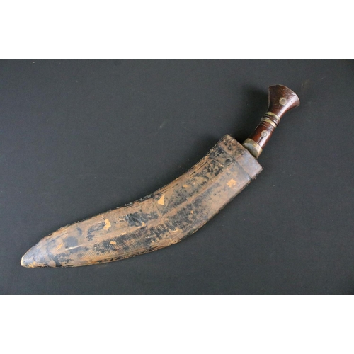 168 - A 20th century military Kukri knife, steel blade marked 1917 CoJ together with the British broad arr... 