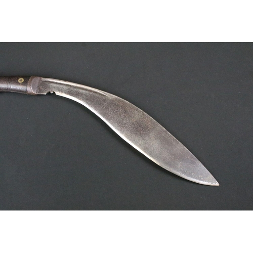 179 - A mid 20th century World War Two / WW2 Pioneer Kukri knife, steel fullered blade marked PIONEER CALC... 