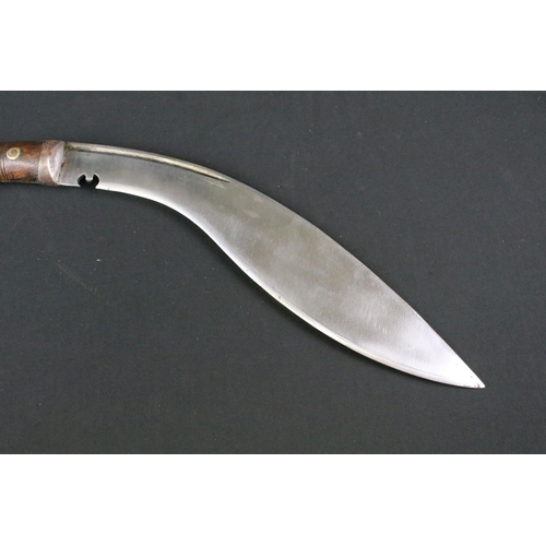 186 - A mid 20th century World War Two / WW2 Pioneer Kukri knife, steel fullered blade marked PIONEER CALC... 