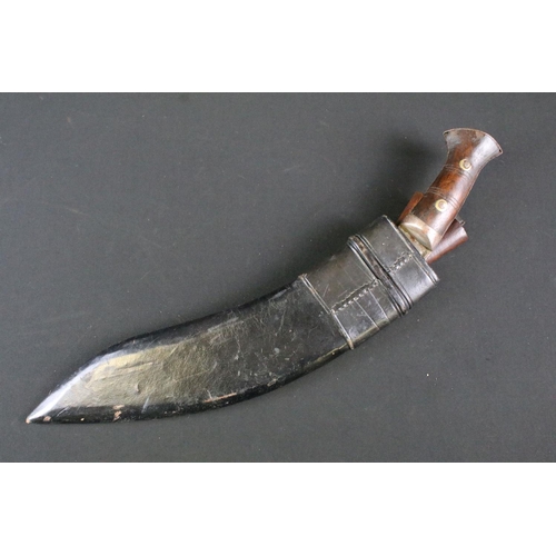 186 - A mid 20th century World War Two / WW2 Pioneer Kukri knife, steel fullered blade marked PIONEER CALC... 