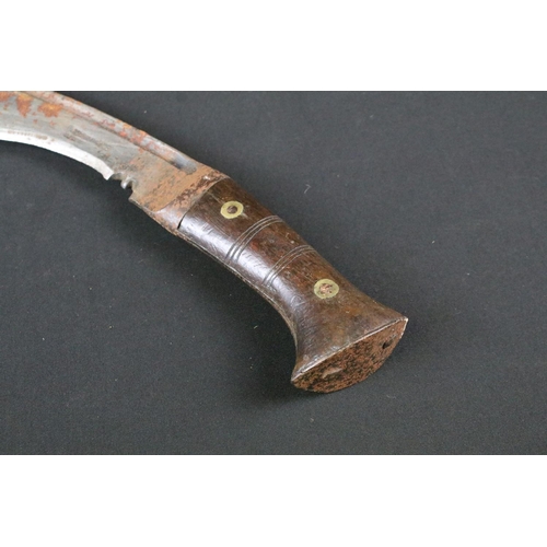 187 - A mid 20th century World War Two / WW2 Pioneer Kukri knife, steel fullered blade marked PIONEER CALC... 