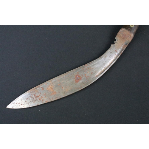 187 - A mid 20th century World War Two / WW2 Pioneer Kukri knife, steel fullered blade marked PIONEER CALC... 