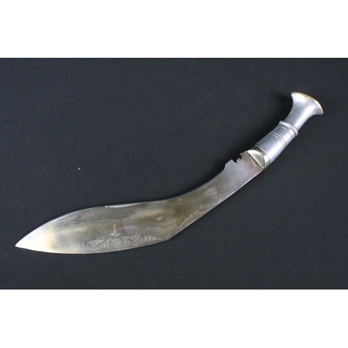 190 - A 20th century Kukri knife, steel blade with dot engraved decoration and marked India, aluminium han... 