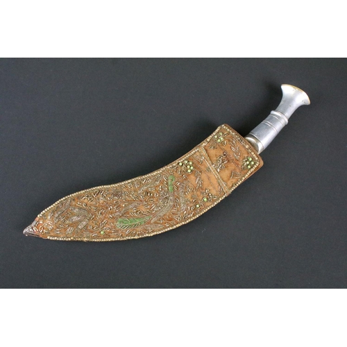 190 - A 20th century Kukri knife, steel blade with dot engraved decoration and marked India, aluminium han... 