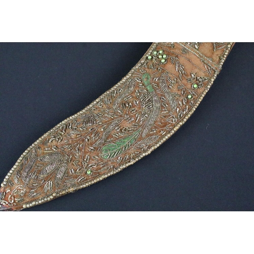 190 - A 20th century Kukri knife, steel blade with dot engraved decoration and marked India, aluminium han... 