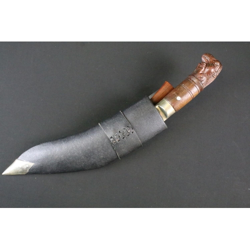 195 - A Garud Ang Khola (Dragon) Kukri knife, polished steel Chirra blade, blade signed K.M., nickle silve... 