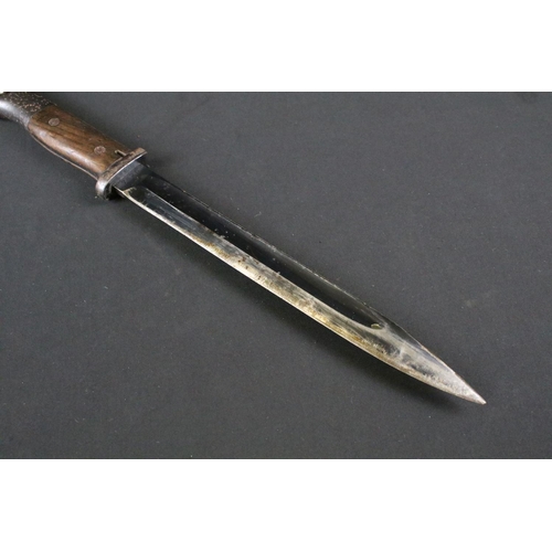 197 - A German World War Two / WW2 K98 Mauser Bayonet S/242G with Scabbard. Marks on the blade both sides,... 