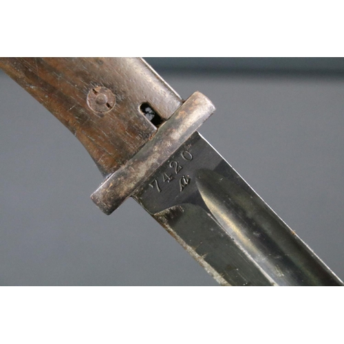 197 - A German World War Two / WW2 K98 Mauser Bayonet S/242G with Scabbard. Marks on the blade both sides,... 