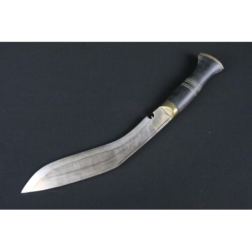 206 - A late 20th century Kukri knife, steel handle with single grooved blade, turned horn handle, brass p... 