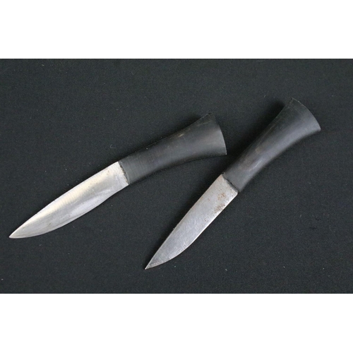 206 - A late 20th century Kukri knife, steel handle with single grooved blade, turned horn handle, brass p... 