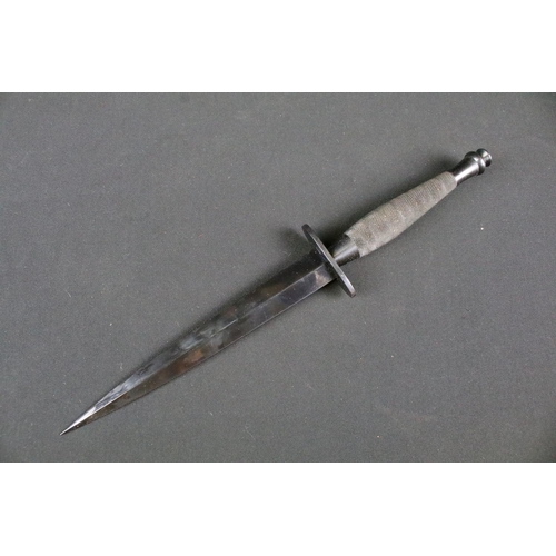 207 - A contemporary Fairbairn Sykes commando fighting knife, marked J. Nowil & Sons Sheffield England tog... 