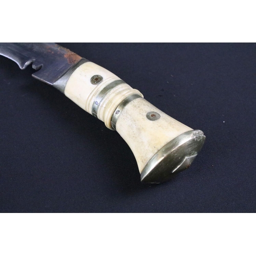 211 - A mid 20th century Chirra Kukri knife, steel blade with Chirra and grooved fullers, bone riveted han... 