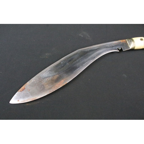 211 - A mid 20th century Chirra Kukri knife, steel blade with Chirra and grooved fullers, bone riveted han... 