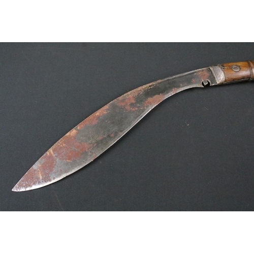 214 - A World War Two / WW2 Mk.2 military issued Kukri knife, groove fullered steel blade, two piece woode... 