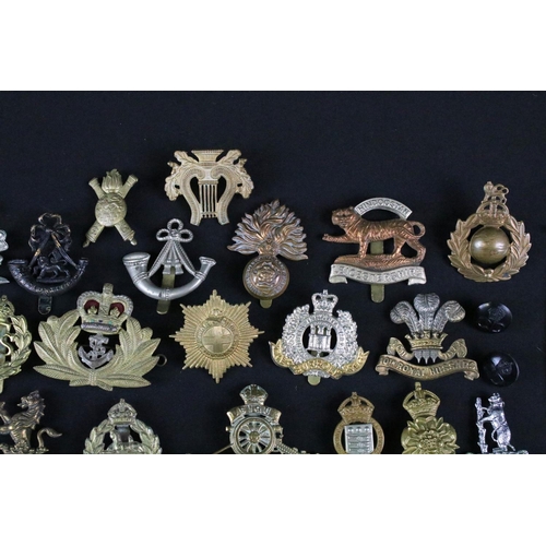 24 - A collection of mixed militaria to include a full size British World War Two / WW2 1939-1945 British... 