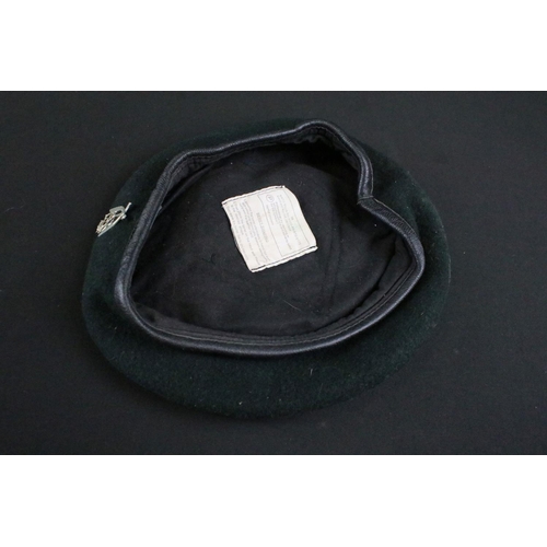 246 - A genuine NATO issued green military beret badged to the 7th Gurkha rifles.