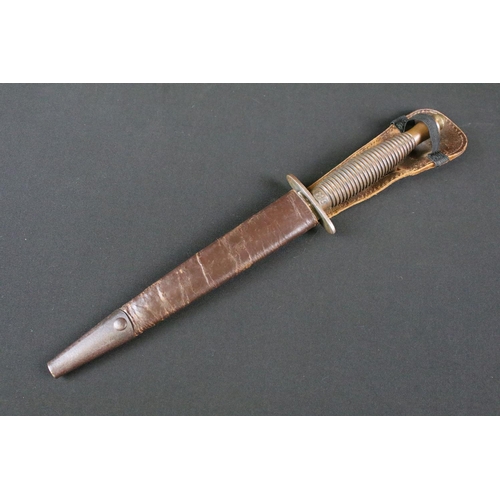 26 - A Fairbairn Sykes Commando Knife / Dagger marked with the crossed keys logo of A.J. Nowill & Son tog... 