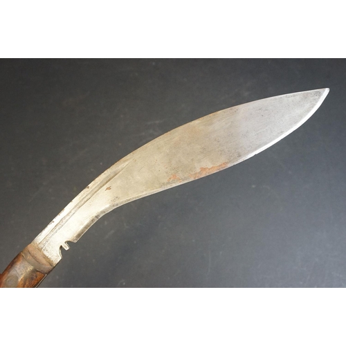 276 - A World War Two / WW2 Kukri knife, steel fullered blade, blade marked AW 43, two piece riveted woode... 