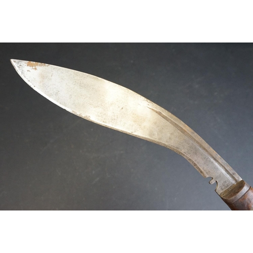 276 - A World War Two / WW2 Kukri knife, steel fullered blade, blade marked AW 43, two piece riveted woode... 