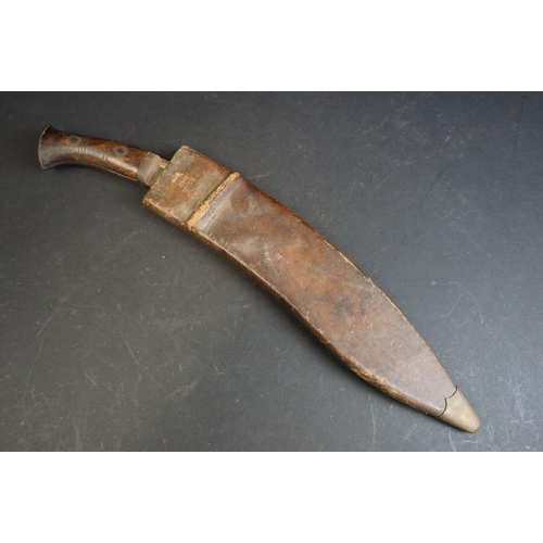 276 - A World War Two / WW2 Kukri knife, steel fullered blade, blade marked AW 43, two piece riveted woode... 