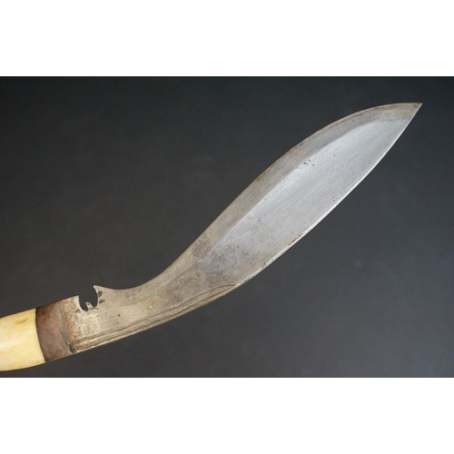 277 - A small vintage Kukri knife, steel blade with twin grooved fullers, turned bone handle, blade measur... 