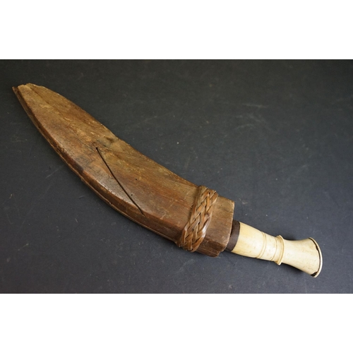 277 - A small vintage Kukri knife, steel blade with twin grooved fullers, turned bone handle, blade measur... 