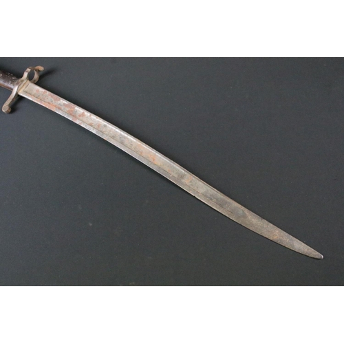 282 - A 19th century sword bayonet, steel blade measures approx 54cm, two piece wooden riveted handle meas... 