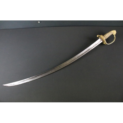 284 - A Victorian Naval Sword, plain 74.5cm curved blade, Regulation gilt brass hilt with white rayskin gr... 