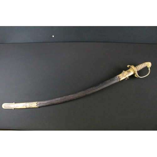 284 - A Victorian Naval Sword, plain 74.5cm curved blade, Regulation gilt brass hilt with white rayskin gr... 