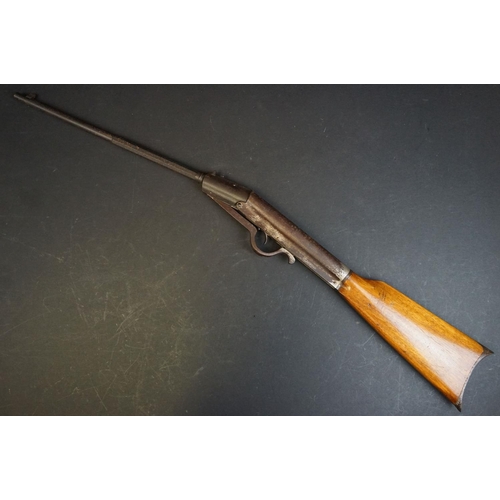 290 - A vintage break action air rifle. approx 85cm in length.