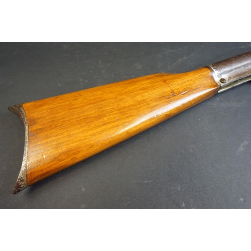 290 - A vintage break action air rifle. approx 85cm in length.