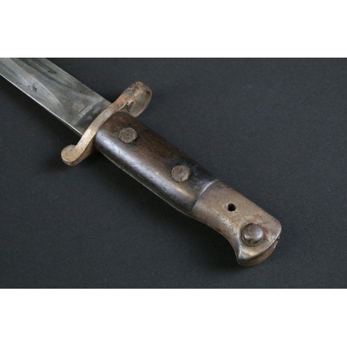 293 - A British 1903 pattern bayonet, double edged steel blade, stamped 1903 beneath crown to the lower bl... 