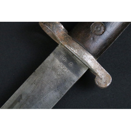 293 - A British 1903 pattern bayonet, double edged steel blade, stamped 1903 beneath crown to the lower bl... 