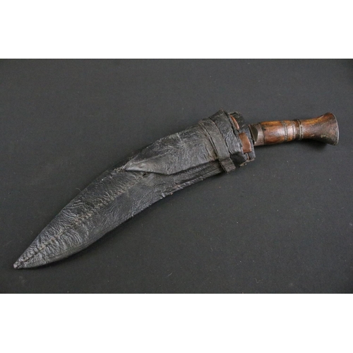 294 - An early 20th century (c.1930's) Dia Chirra Kukri knife, steel chirra blade with grooved fuller, tur... 