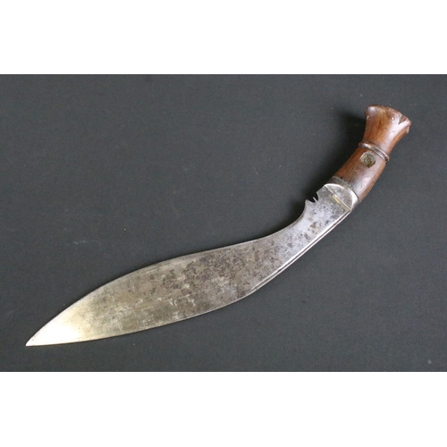 312 - A mid 20th century World War Two / WW2 era Kukri knife, single groove fullered steel blade, turned w... 