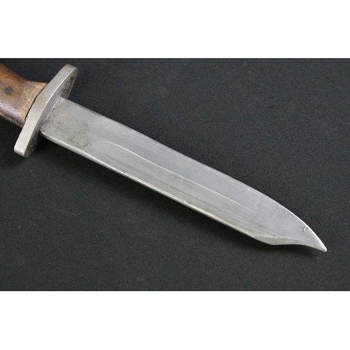 321 - An early to mid 20th century British repurposed bayonet trench fighting knife, steel blade measuring... 