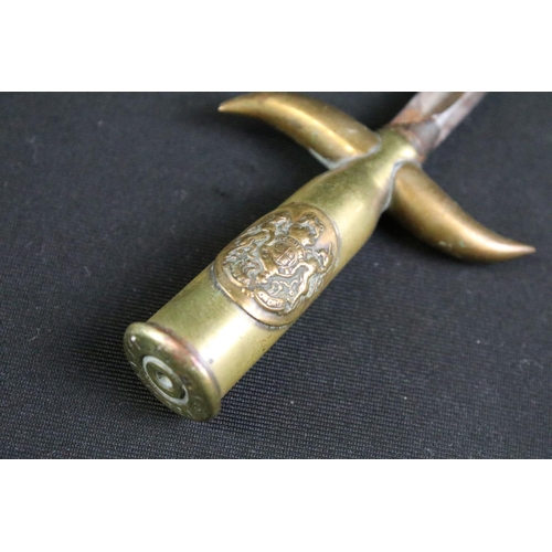 328 - A World War One / WW1 trench art dagger / letter opener, the handle made from a spent shell case wit... 