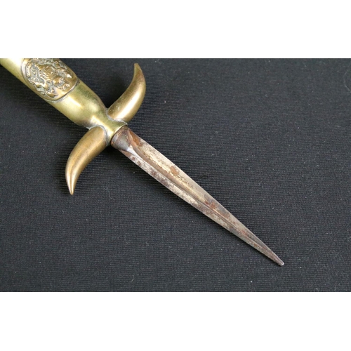 328 - A World War One / WW1 trench art dagger / letter opener, the handle made from a spent shell case wit... 