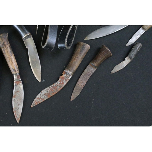 330 - A collection of Kukri small knives and sharpeners together with two leather covered scabbards and a ... 