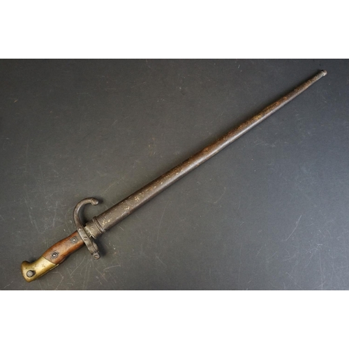 336 - A French World War One / WW1 era M1874 Gras Bayonet (St. Etienne, Fevier 1877) together with scabbar... 