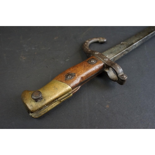 336 - A French World War One / WW1 era M1874 Gras Bayonet (St. Etienne, Fevier 1877) together with scabbar... 